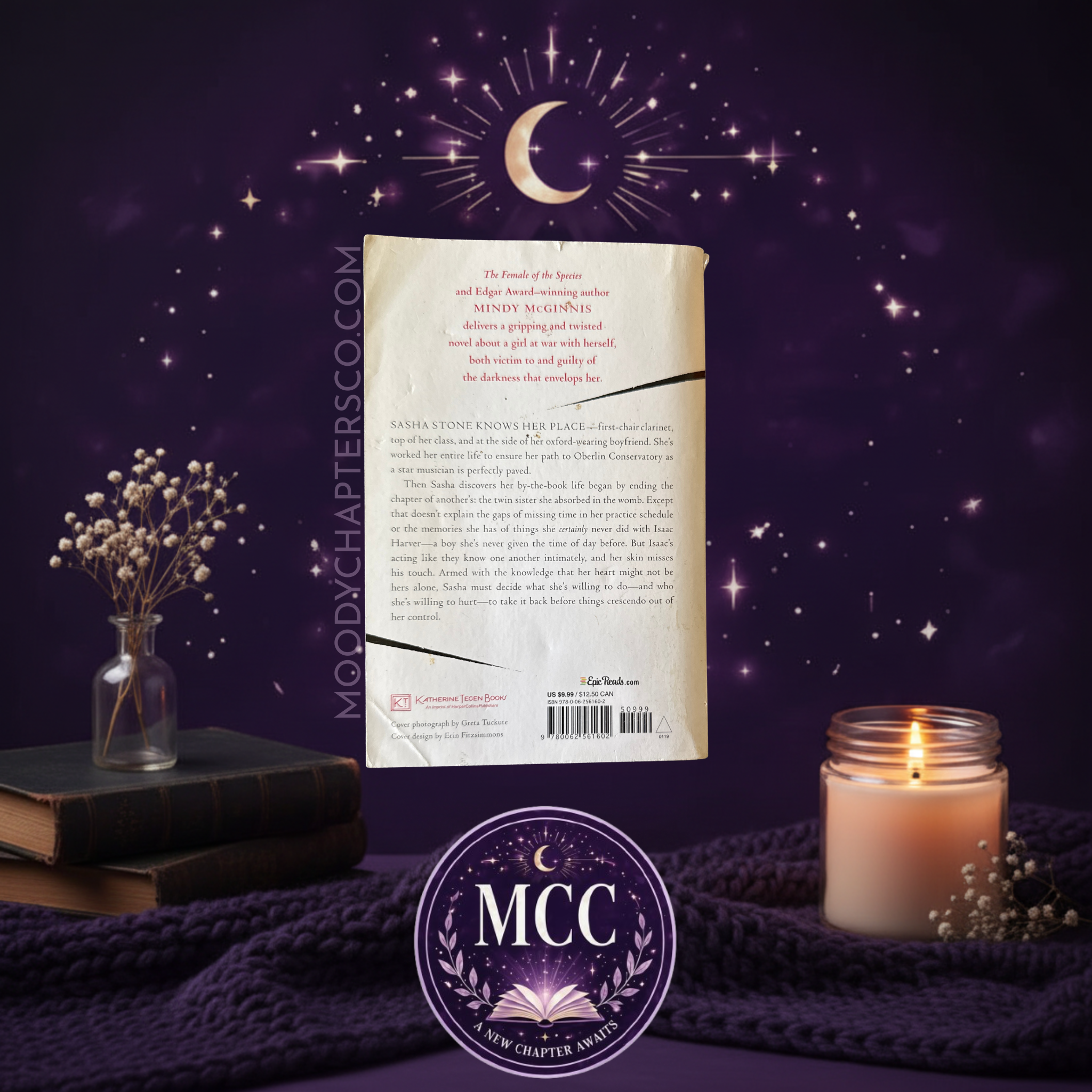 BACK COVER of This Darkness Mine by Mindy McGinnis. PAPERBACK 
Has some wear. 
MCC- Moody Chapters Co. 
www.moodychaptersco.com